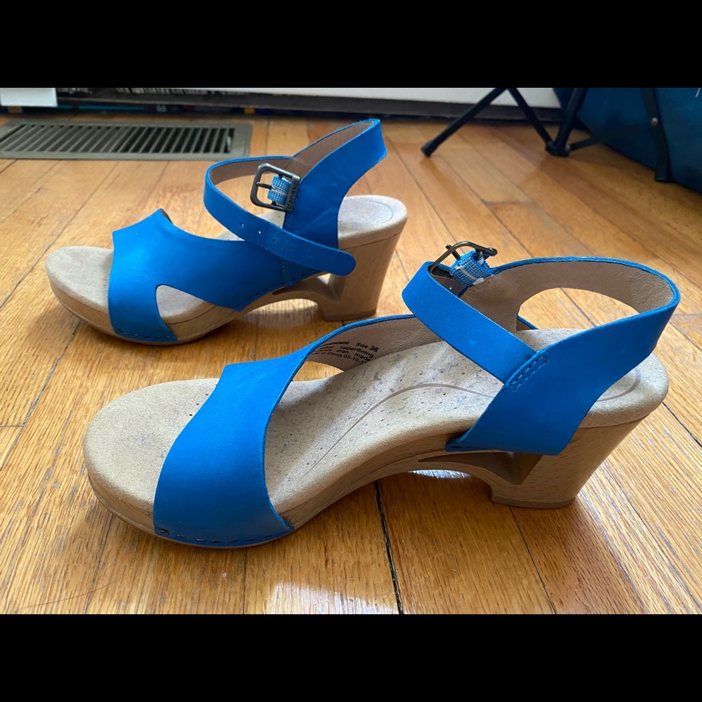 Bright blue Dansko Tasha sandals with heel
